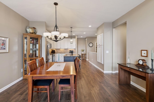 8160 Virginia Ln, Savage, MN 55378 - dining room with dark wood-type flooring, a chandelier, and recessed lighting