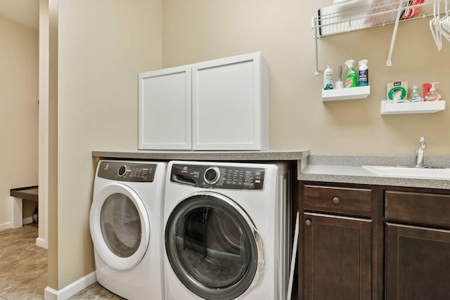 8160 Virginia Ln, Savage, MN 55378 - washroom with independent washer and dryer, cabinet space, and light tile patterned floors