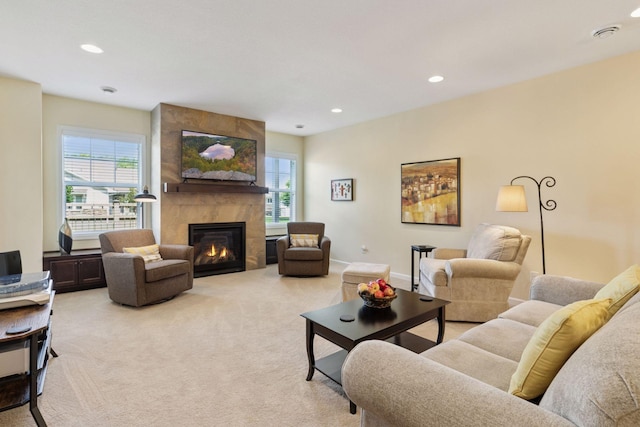 8160 Virginia Ln, Savage, MN 55378 - living room featuring healthy amount of natural light, a fireplace, light colored carpet, and recessed lighting