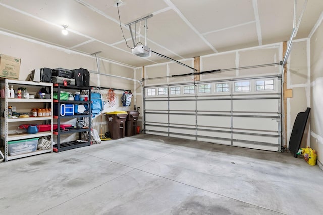 8160 Virginia Ln, Savage, MN 55378 - garage featuring a garage door opener