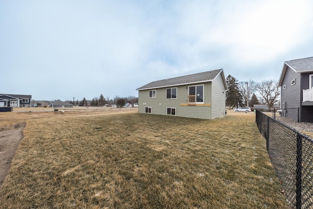 view of property exterior featuring a lawn