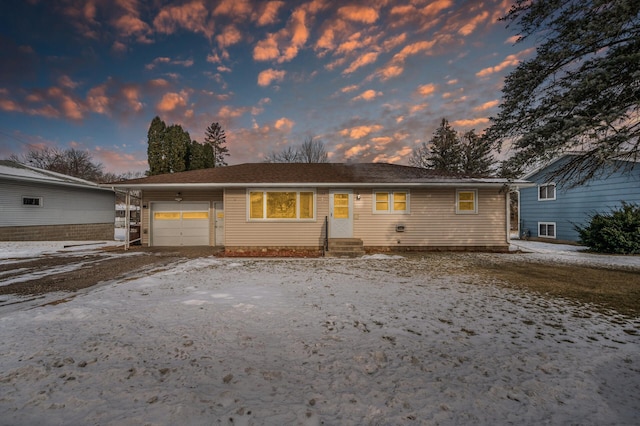 view of front facade featuring a garage and a carport