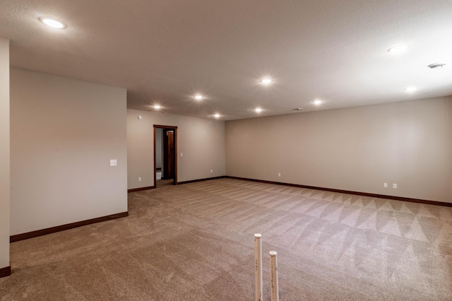 unfurnished room with carpet flooring