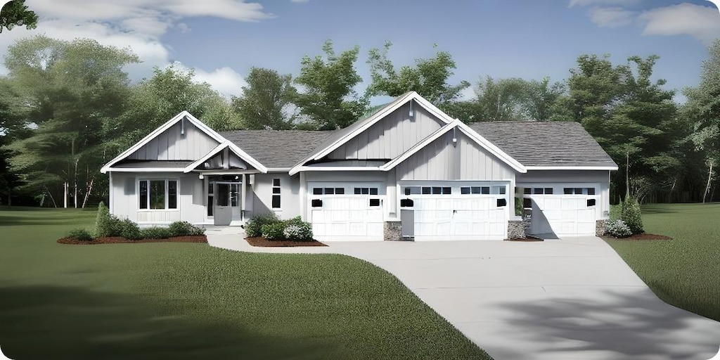 view of front of house featuring a garage and a front lawn