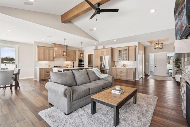 living area with recessed lighting, dark wood-style flooring, vaulted ceiling with beams, and baseboards