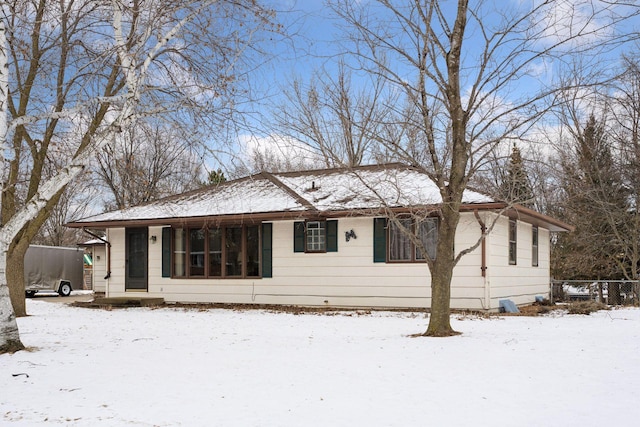 view of snow covered property