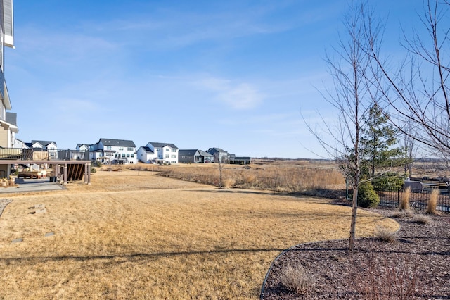 view of yard featuring a residential view