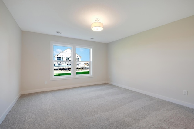 13104 Ghia Ct NE, Blaine, MN 55449 - spare room with light carpet and baseboards