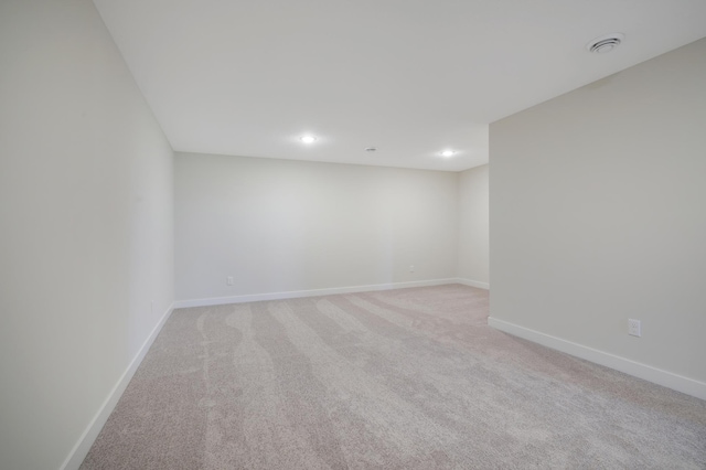 13104 Ghia Ct NE, Blaine, MN 55449 - empty room with light colored carpet, baseboards, and recessed lighting