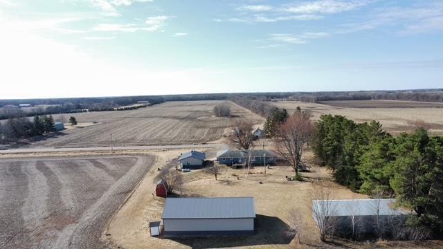 birds eye view of property featuring a rural view