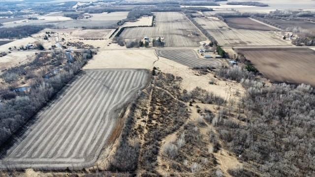 birds eye view of property featuring a rural view