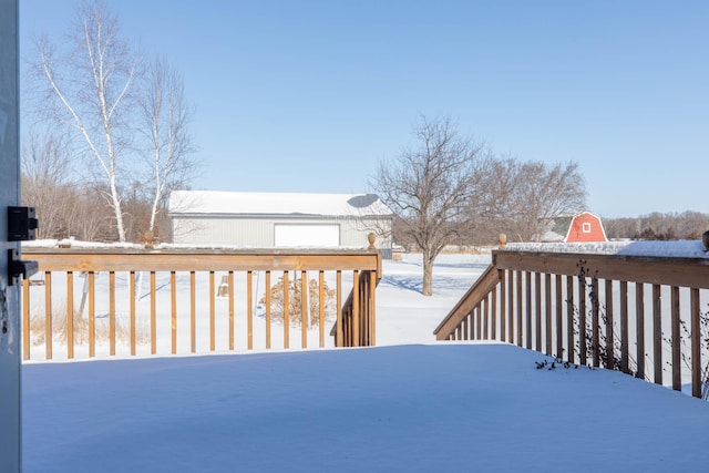view of snow covered deck