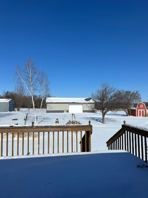 view of yard layered in snow