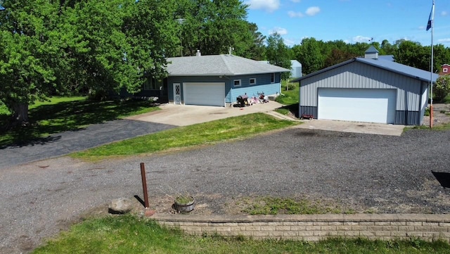 13959 55th St NE, Foley, MN 56329 - single story home featuring a detached garage and an outdoor structure
