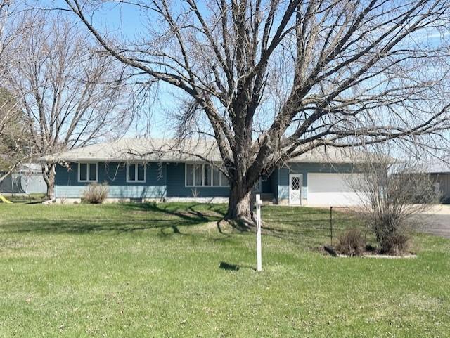 13959 55th St NE, Foley, MN 56329 - ranch-style home with a front lawn and a garage