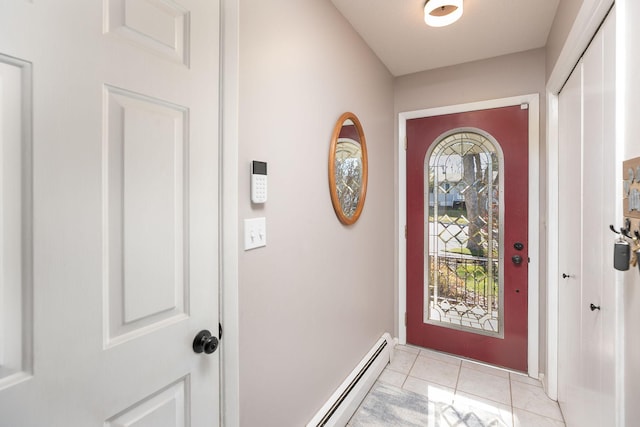 doorway featuring light tile patterned flooring and a baseboard radiator