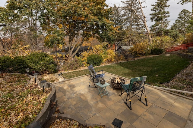 view of patio featuring an outdoor fire pit