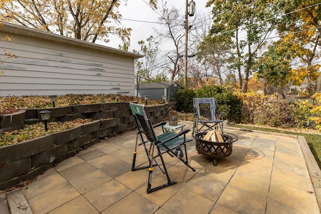 view of patio featuring a fire pit