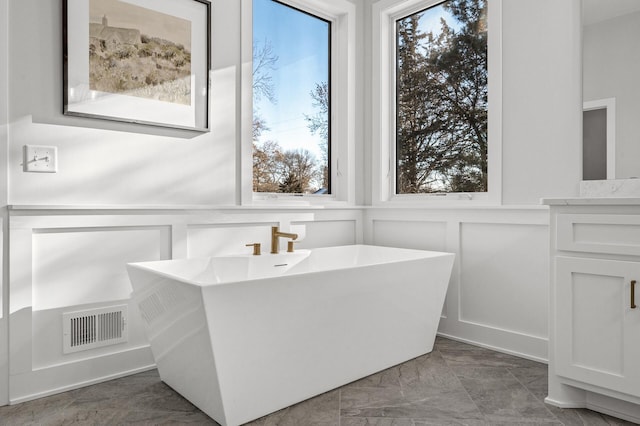 bathroom featuring a washtub