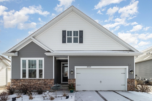 craftsman-style house featuring a garage