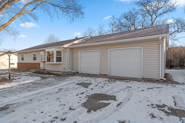 ranch-style house with a garage