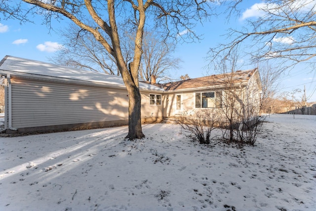 view of snow covered property