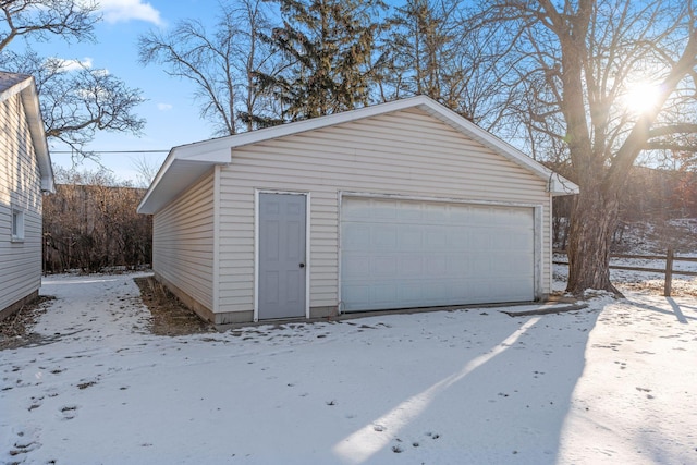 view of snow covered garage