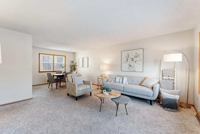 living room featuring light carpet