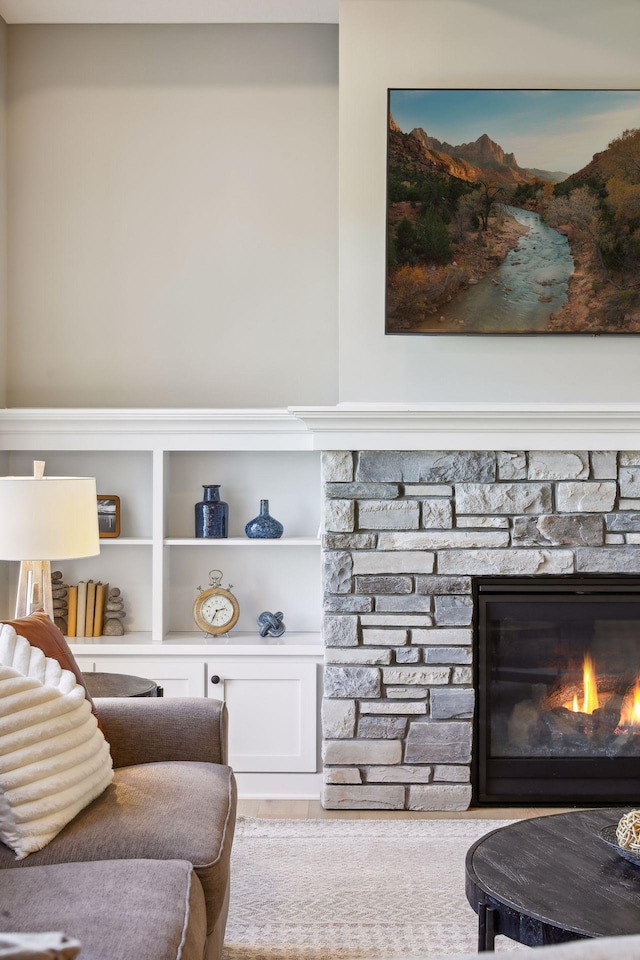 interior space featuring a stone fireplace