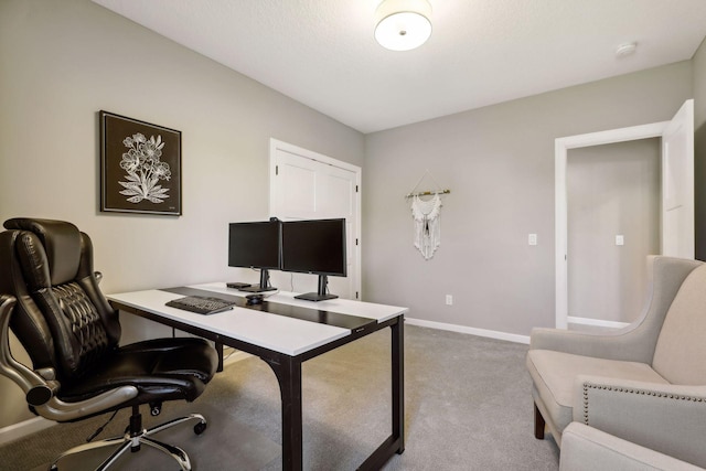 home office with carpet flooring