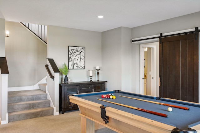 game room with billiards, a barn door, and carpet floors