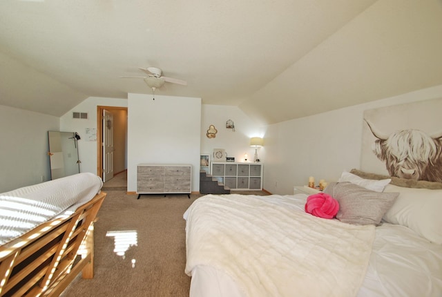 carpeted bedroom featuring vaulted ceiling and ceiling fan