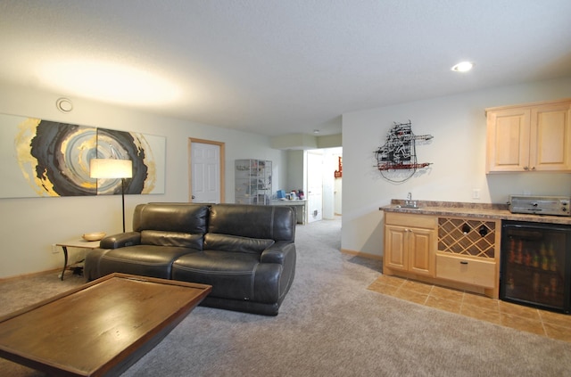 living room featuring light carpet, wine cooler, and indoor bar