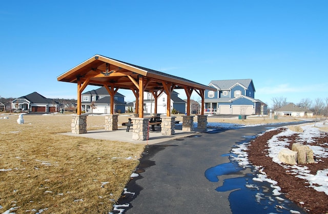 view of community with a gazebo and a lawn