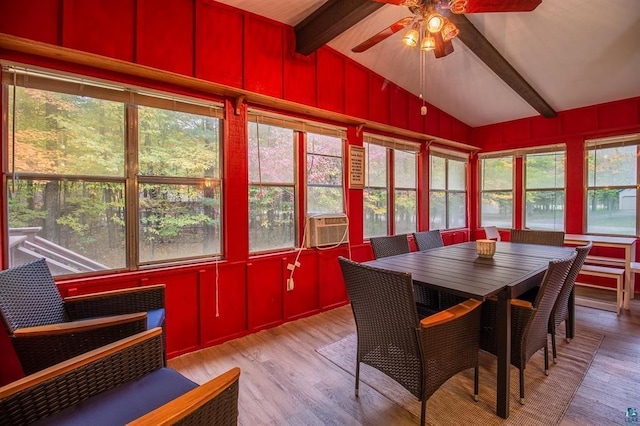 sunroom / solarium with lofted ceiling with beams, cooling unit, and ceiling fan