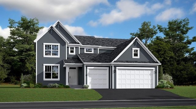 view of front of home with a garage and a front lawn