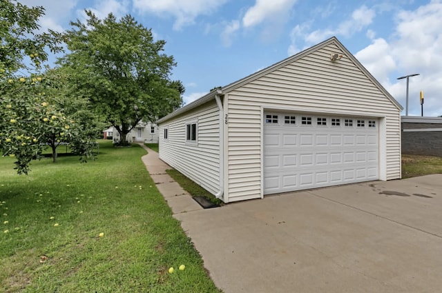 garage with a lawn