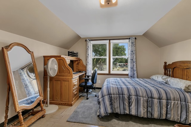 bedroom featuring vaulted ceiling