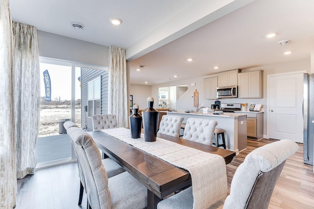 dining area featuring light hardwood / wood-style flooring