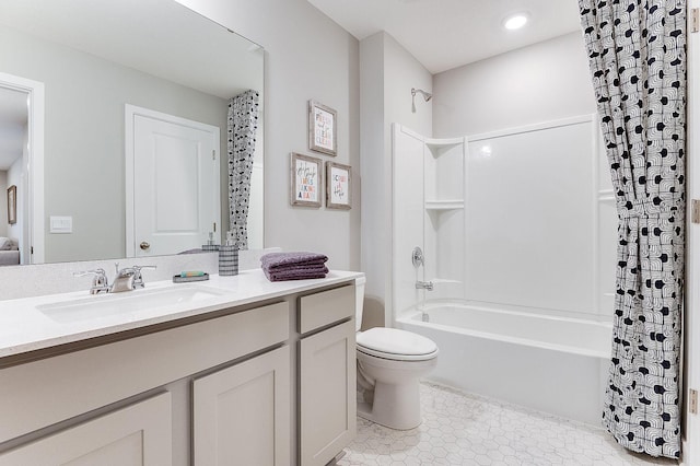 full bathroom with toilet, shower / tub combo with curtain, tile patterned flooring, and vanity