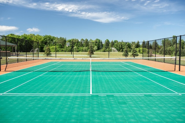 view of sport court featuring basketball hoop