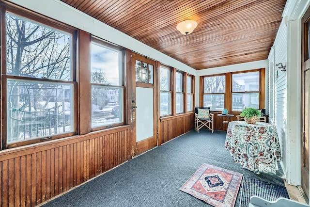 sunroom with wooden ceiling