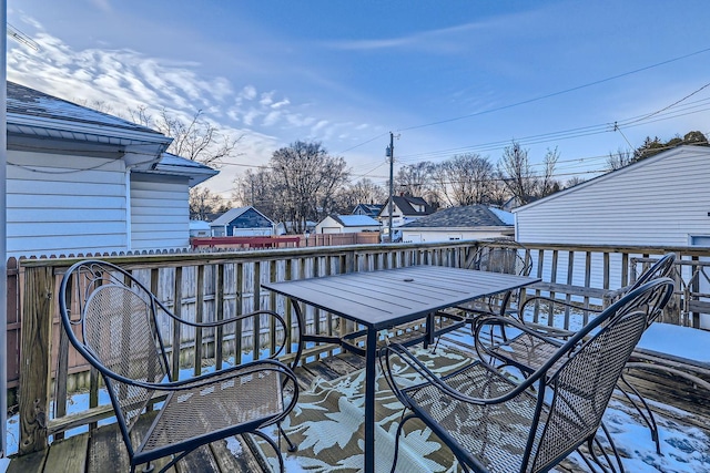 view of snow covered deck