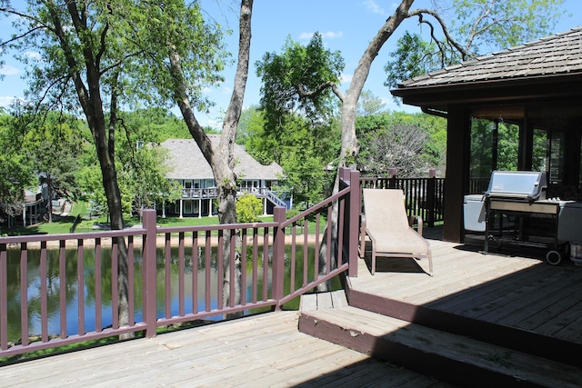 15802 Nursery Dr, Minnetonka, MN 55345 - deck with a water view and area for grilling