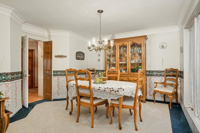 15802 Nursery Dr, Minnetonka, MN 55345 - dining space featuring a chandelier, crown molding, light carpet, and baseboards