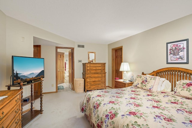 15802 Nursery Dr, Minnetonka, MN 55345 - bedroom featuring light carpet, ensuite bath, and baseboards
