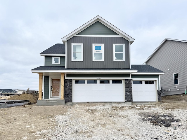 front of property with a garage