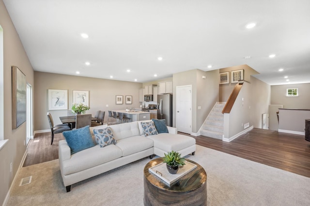 living room with hardwood / wood-style floors