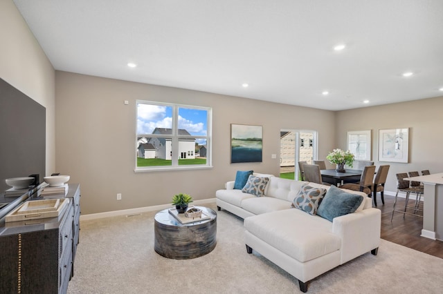 living room featuring a wealth of natural light