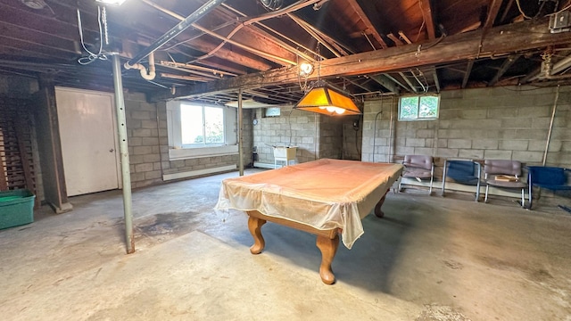 playroom featuring baseboard heating, pool table, and concrete flooring